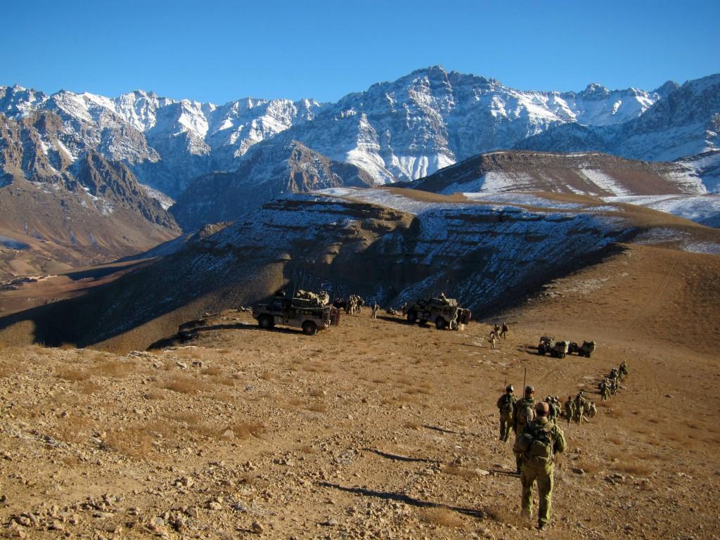 Australian Special Operations Task Group Soldiers patrol though snow peaked valleys in Northern Uruzgan.