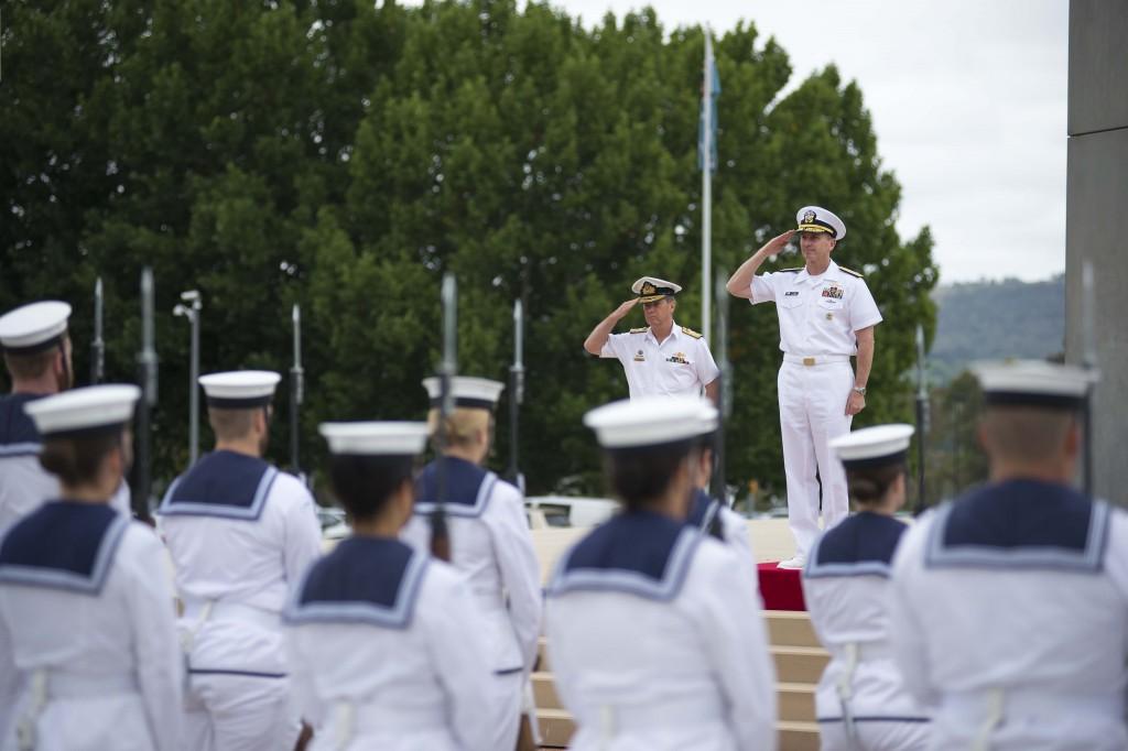 CANBERRA, Australia (Feb. 10, 2015) Chief of Naval Operations (CNO) Adm. Jonathan Greenert and Vice Adm. Tim Barrett, Australian chief of navy, salute the Australian Federation Guard and national flag during a full honors ceremony to welcome Greenert to the Russell Offices, which is the Australian defense headquarters. Greenert is in Australia meeting with government and military leadership to discuss continued mutual maritime security interests and enhanced partnership opportunities. (U.S. Navy photo by Chief Mass Communication Specialist Peter D. Lawlor/Released)