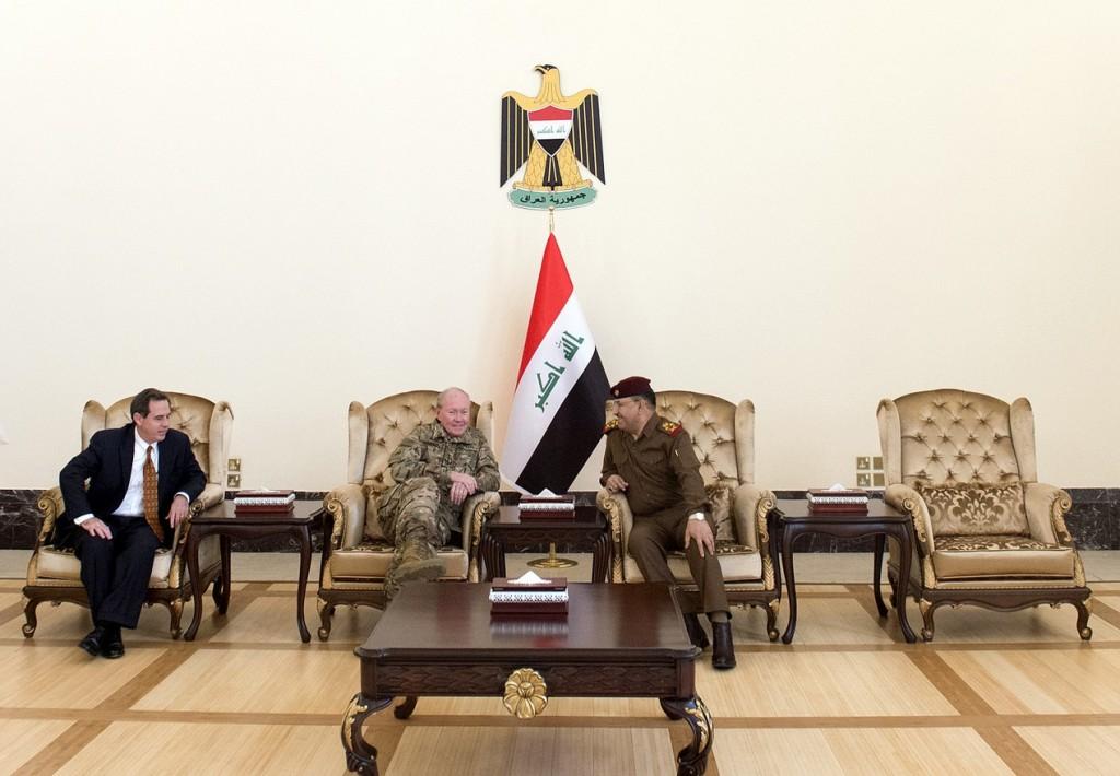 A senior Iraqi military officer waits with US Chairman of the Joint Chiefs of Staff, Gen. Martin E. Dempsey, and US Ambassador to Iraq, Stuart E. Jones, prior to a meeting with the Iraqi Prime Minister in Baghdad International Airport in Baghdad, Iraq, Mar. 9, 2015. (DOD photo by D. Myles Cullen/Released)