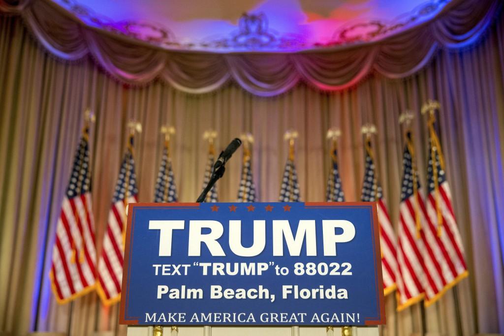 The podium where Republican presidential candidate Donald Trump will speak on Super Tuesday primary election night at the White and Gold Ballroom at The Mar-A-Lago Club in Palm Beach, Fla., Tuesday, March 1, 2016. (AP Photo/Andrew Harnik)