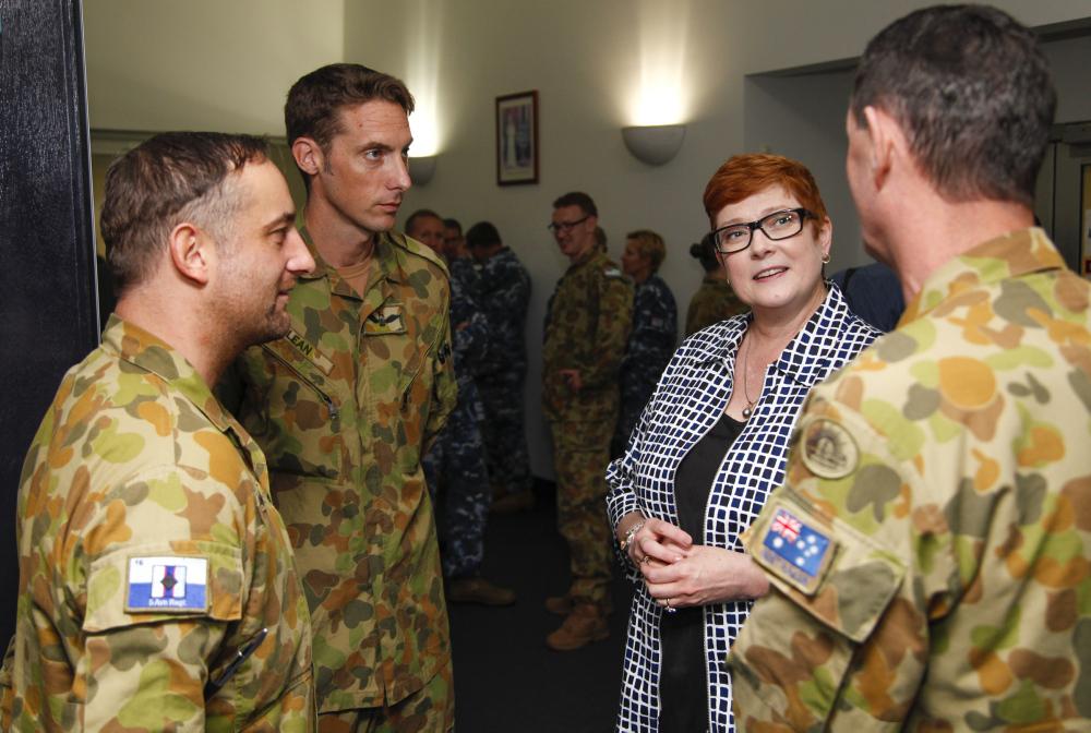 Minister for Defence, Senator the Honourable Marise Payne talks with members of 5th Aviation Regiment on RAAF Base Townsville. *** Local Caption *** Minister for Defence, Senator the Honourable Marise Payne visited RAAF Base Townsville on 22 April 2016. Senator Payne met with RAAF Townsvilles head of resident units and discussed their capabilities and current achievements within the ADF.