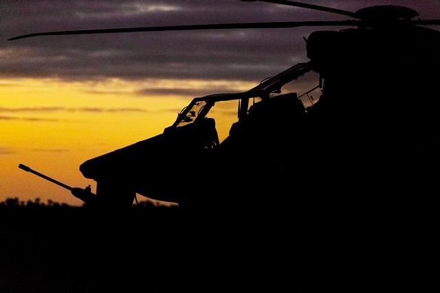 An Australian Army Tiger armed reconnaissance helicopter from 1st Aviation Regiment sits in Battlegroup Griffin's position at Port Pirie, South Australia, on 2 July 2016 during Exercise Hamel. *** Local Caption *** The Australian Armys 1st Brigade is being tested from 26 June to 14 July 2016 in South Australia as part of Exercise Hamel to ensure its soldiers are ready to meet the Australian Governments needs as the Australian Defence Forces ready brigade. Battlegroup Griffin is a multirole Army aviation battlegroup made up aircrew and technicians and Tiger armed reconnaissance helicopters from 1st Aviation Regiment, and MRH-90 Taipan and CH-47F Chinook helicopters from 5th Aviation Regiment. Royal Australian Air Force personnel from the 3rd Security Forces Squadron are attached to Battlegroup Griffin for Exercise Hamel to provide intrinsic airfield security. Army uses the Road to Hamel to build up its next ready brigade and Exercise Hamel is the final test. In 2016, Darwin's 1st Brigade is being put through its paces to ensure it is ready to support operational contingencies ranging from humanitarian assistance through to major combat operations. Exercise Hamel 2016 involves 8000 military personnel from the Australian Army, Royal Australian Navy, Royal Australian Air Force, United States Marine Corps, United States Army and the New Zealand Army. For the first time, Exercise Hamel is being conducted in South Australia and will take place around Port Augusta, Port Pirie, Whyalla and the Cultana training area.